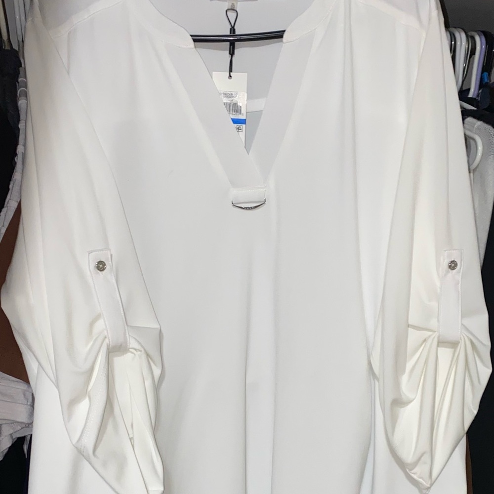 Calvin Klein woman’s blouse. Size XL